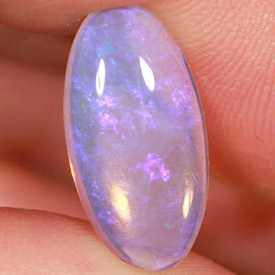 SOLID CRYSTAL OPAL Large opal with an even purple hue
